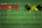 Suriname vs Jamaica Soccer Match, national colors, national flags, soccer field, football game, Copy space