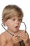 Surprise child with stethoscope