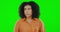 Surprise, green screen and face of scared woman, shock and alarm on color background, wow and alert. Portrait, female