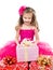 Surprised adorable little girl with christmas gift boxes