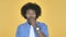 Surprised Afro-American Man in Shock on Yellow Background, wondering