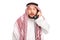 Surprised Arab holding a telephone speaker
