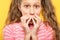 Surprised astonished girl covering mouth reaction