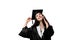 Surprised bachelor girl in graduation robe and cap on white background. Happy and funny young woman smile. Student
