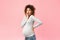 Surprised black pregnant woman closing mouth, pink background