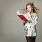 Surprised Blonde Woman Reading a Book