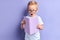 Surprised boy kid holding book. Education portrait concept