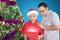 Surprised boy opening a sparkles gift from his father