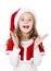 Surprised cute little girl in santa hat isolated