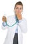 Surprised doctor woman using stethoscope