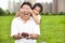 Surprised father holding gift box from little girl