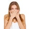 Surprised happy beautiful woman covering her mouth with hand. isolated over white