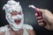 Surprised man with shaving foam on his face