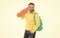 surprised man in yellow hoody with skateboard. adult skateboarder. male casual hipster style
