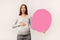 Surprised Pregnant Woman Holding Pink Speech Bubble, Over White Background