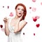 Surprised red-haired woman holding lollipop