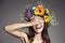 Surprised Smiling Woman With Flower Wreath On Her Head.