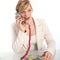 Surprised woman on a landline telephone