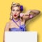 Surprised woman with phone and blank signboard, pinup, yellow