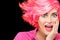 Surprised woman with trendy gradient pink hair