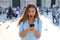 Surprised young woman using smart phone outdoors. Close up portrait surprised screaming girl looking at phone seeing news or