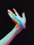 Surreal artistic hand composition. Creative artwork of human hands. Colorful paint. Dark background. Ai generated illustration