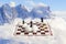 Surreal chess match on the alps