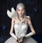 Surreal dancer portrait with a white swan