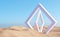 Surreal desert landscape with white rhombus portals