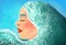 Surreal illustration of a woman underwater. Wave covering the woman with her head. Art illustration profile of a woman, feeling of