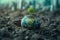 A surreal image of small green tree growing atop a globe in soil against a backdrop of cityscape. Generative AI