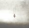 Surreal image of a woman on a swing suspended in the sky