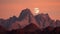 A surreal moonrise over a jagged mountain range