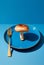 Surreal Mushroom on Blue Plate