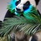 A surreal panda with peacock feathers, showcasing a stunning display of iridescent patterns1, Generative AI