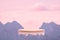 Surreal podium outdoors on sky pink pastel soft cloud with misty mountain nature landscape background.Beauty cosmetic product