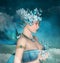 Surreal portrait of a woman with blue butterflies