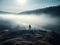A surreal shot of a silhouetted figure standing at the edge of a vast misty landscape created with Generative AI