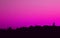 Surreal Style Fantastic City Skyline in Purple Pink Color