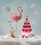 Surreal wonderland party with a pink flamingo