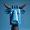 Surrealist Bull Figurine With Green Face And Blue Ears
