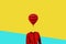 Surrealistic minimal concept. A balloon instead of a human head. Minimalism and surrealism