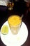 Sururu broth with lemon accompanied by a glass of beer