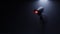 Surveillance camera glowing in the dark. Ominous mood scene with negative space. Digital 3D rendering