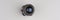 Surveillance camera on a gray background. Closeup. The concept of covert surveillance