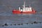 Survey ship checks erotion tide rising over a jetty - 04