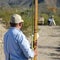 A Surveying Team Works on a Road