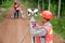 Surveyor or Engineer making measure by Theodolite in a field.