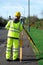 Surveyor site engineer installing tacheometer above control point before performing setting out for construction works and as