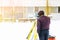 Surveyor uses a total station in construction